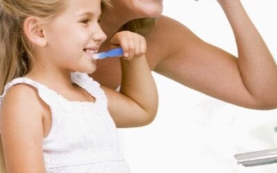 WHY DO WE BRUSH OUR TEETH?